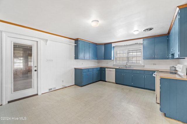 kitchen with blue cabinetry, white appliances, and sink