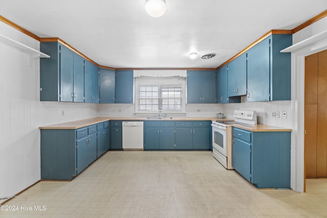 kitchen featuring blue cabinetry, sink, and white appliances