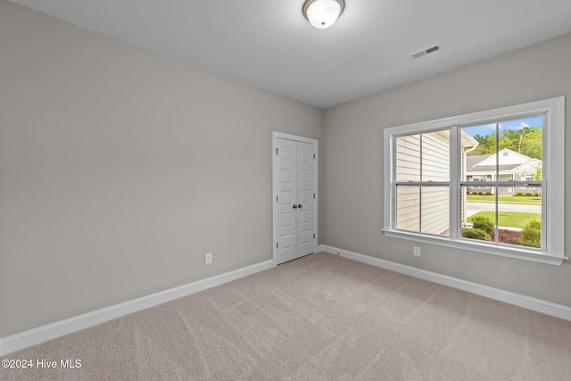 view of carpeted spare room