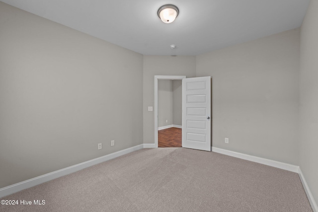 unfurnished bedroom featuring carpet