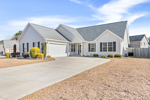 ranch-style home featuring a garage