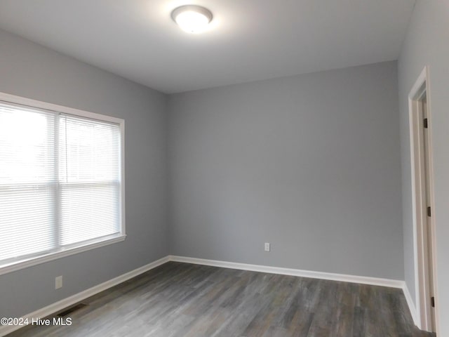 12521 Mckinnon Dr, Laurinburg, NC 28352 - spare room featuring dark wood finished floors