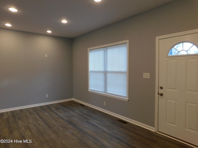 entrance foyer with dark hardwood / wood-style floors