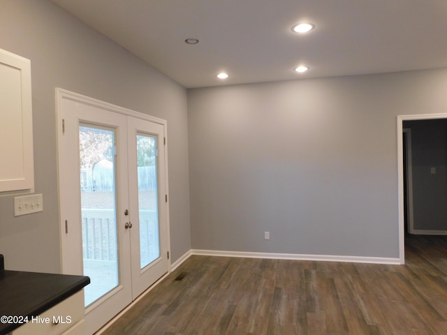 12521 Mckinnon Dr, Laurinburg, NC 28352 - entryway featuring dark wood-style floors, recessed lighting, and french doors