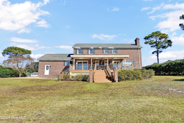 view of front of property with a front lawn and covered porch