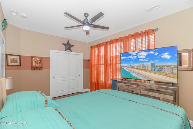 bedroom with a closet and ceiling fan