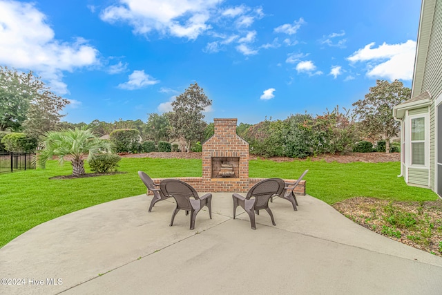 view of patio featuring an outdoor brick fireplace