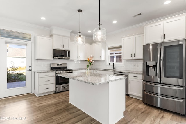 kitchen with white cabinetry, sink, and appliances with stainless steel finishes