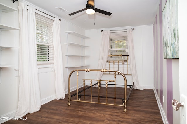 bedroom featuring dark hardwood / wood-style floors