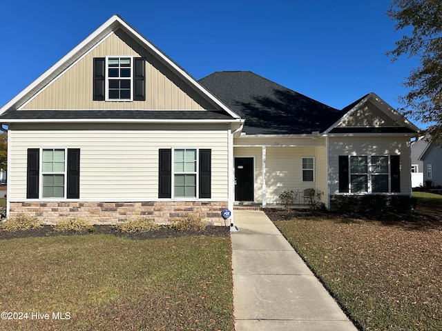 view of front of house with a front lawn