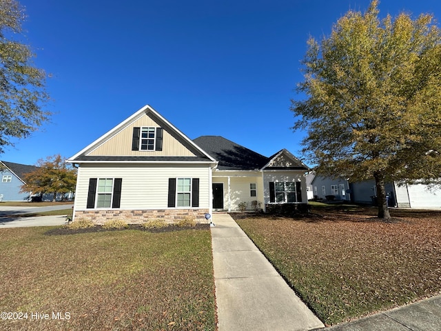 view of front of house with a front lawn