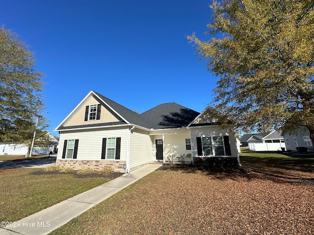 view of front of house with a front lawn