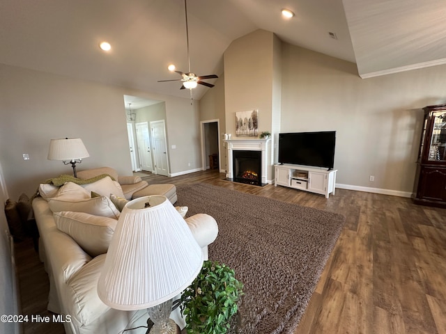 living room featuring ceiling fan, high vaulted ceiling, and dark hardwood / wood-style floors