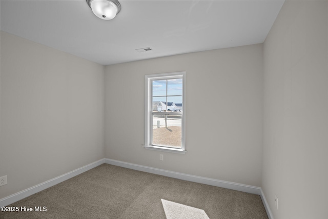 view of carpeted spare room