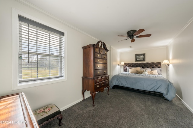 carpeted bedroom with ceiling fan and ornamental molding