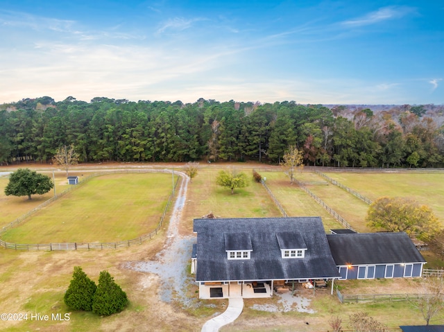 birds eye view of property featuring a rural view