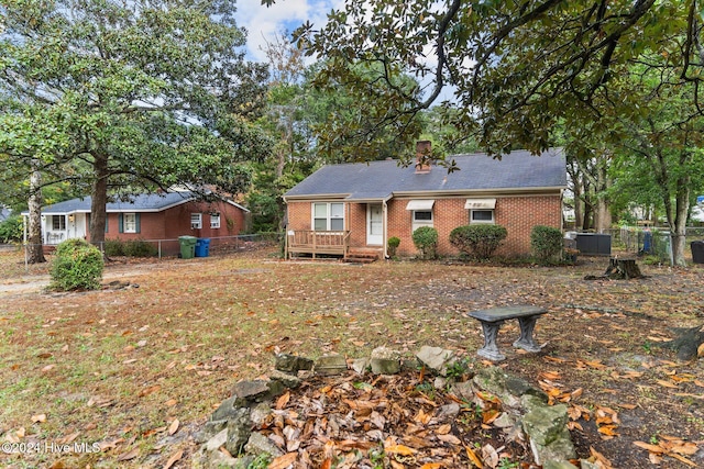 ranch-style home with a deck