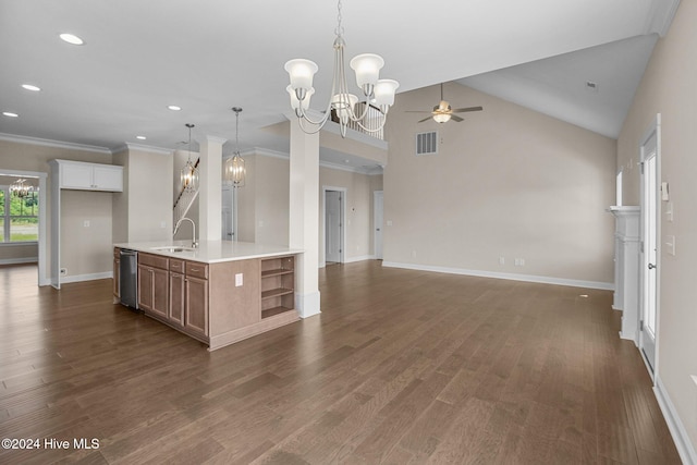 kitchen with white cabinetry, an island with sink, decorative light fixtures, ceiling fan with notable chandelier, and sink