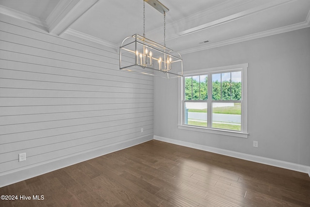 unfurnished room featuring an inviting chandelier, wood walls, dark wood-type flooring, ornamental molding, and beam ceiling