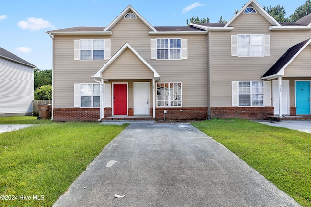 view of front of home with a front yard