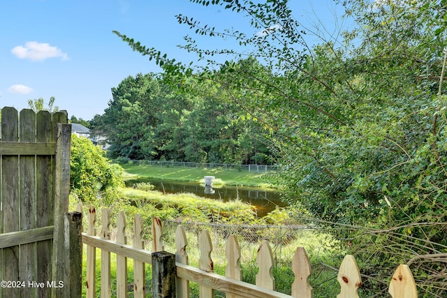 view of yard with a water view