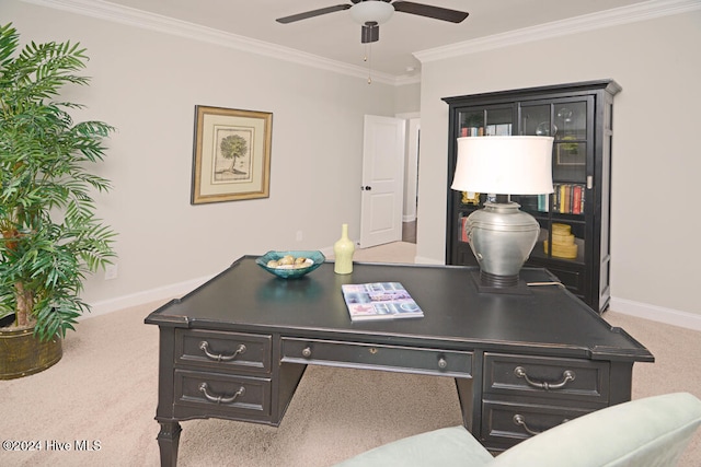 home office featuring light carpet, ceiling fan, and ornamental molding