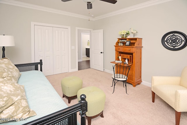 interior space featuring ceiling fan, carpet, and crown molding