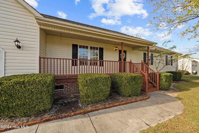 ranch-style home with a porch