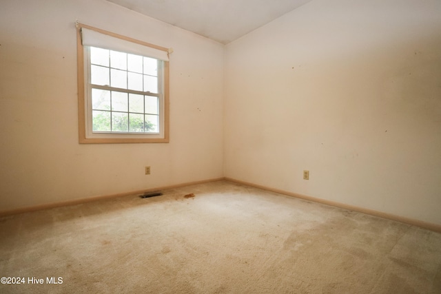 unfurnished room with carpet