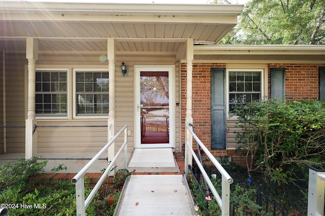 property entrance with a porch