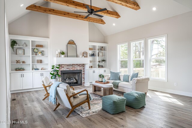 spare room featuring ceiling fan, recessed lighting, a sink, wood finished floors, and baseboards