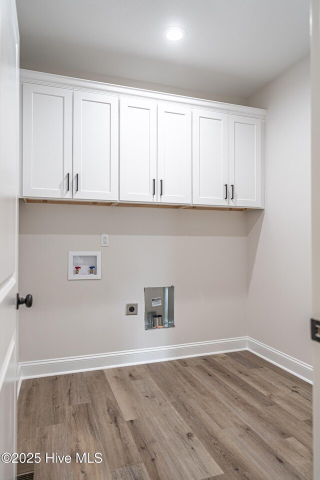 spacious closet with wood finished floors