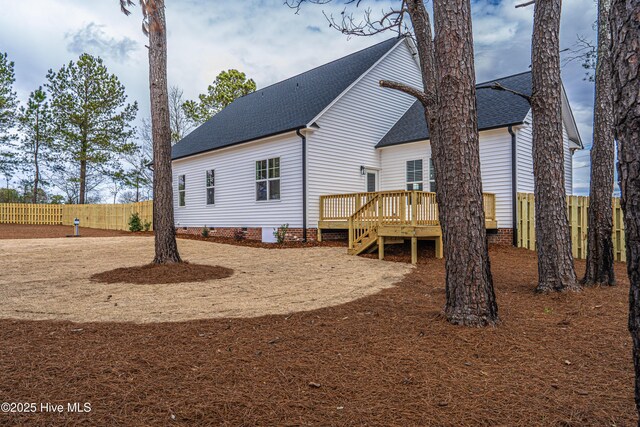 property entrance featuring covered porch and brick siding