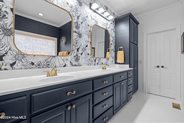 bathroom featuring tile patterned flooring, vanity, and ornamental molding