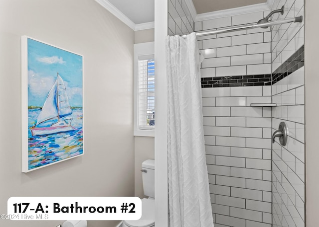 bathroom with a shower with curtain, toilet, and ornamental molding