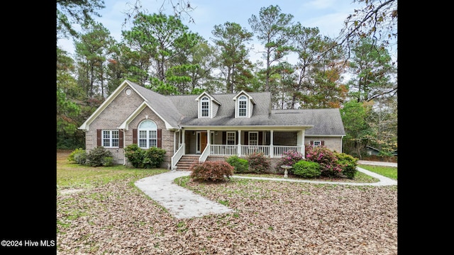 cape cod house with covered porch