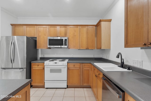 kitchen with light tile patterned flooring, sink, ornamental molding, and stainless steel appliances