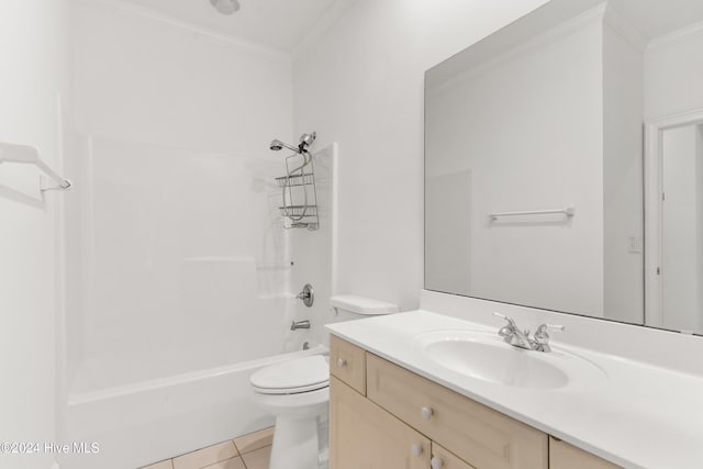 full bathroom featuring washtub / shower combination, tile patterned floors, crown molding, and toilet