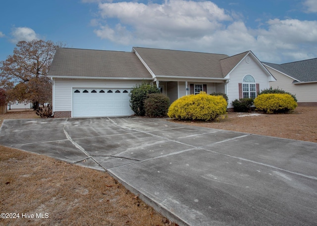 ranch-style home with a garage