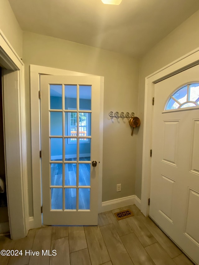 doorway featuring light hardwood / wood-style flooring