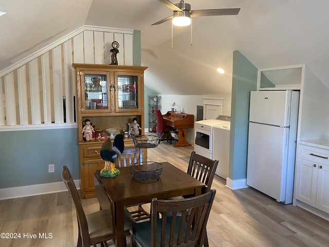 1121 Vance St N, Wilson, NC 27893 - dining area featuring independent washer and dryer, vaulted ceiling, light wood-style floors, and ceiling fan