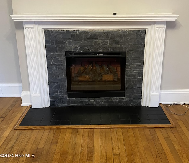 1121 Vance St N, Wilson, NC 27893 - detailed view of wood finished floors and a fireplace with flush hearth