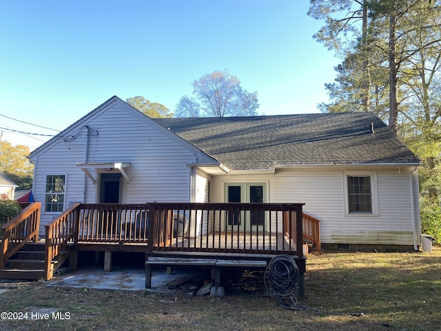 1121 Vance St N, Wilson, NC 27893 - back of property featuring a deck, crawl space, and roof with shingles