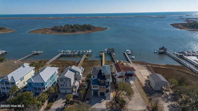 drone / aerial view with a water view