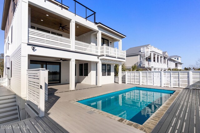 view of swimming pool with a water view