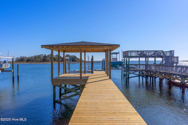 view of dock with a water view