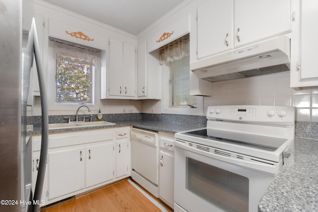 kitchen featuring ornamental molding, white appliances, sink, white cabinets, and light hardwood / wood-style floors