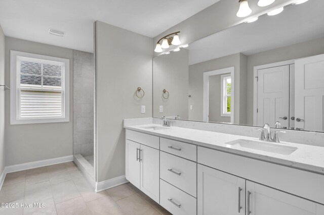 2786 Longleaf Pine Cir, Leland, NC 28451 - bathroom featuring tiled shower and vanity