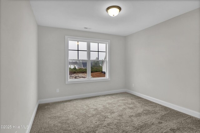 2786 Longleaf Pine Cir, Leland, NC 28451 - unfurnished bedroom featuring carpet floors and baseboards