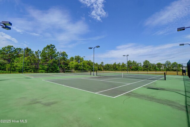 2786 Longleaf Pine Cir, Leland, NC 28451 - view of tennis court with community basketball court